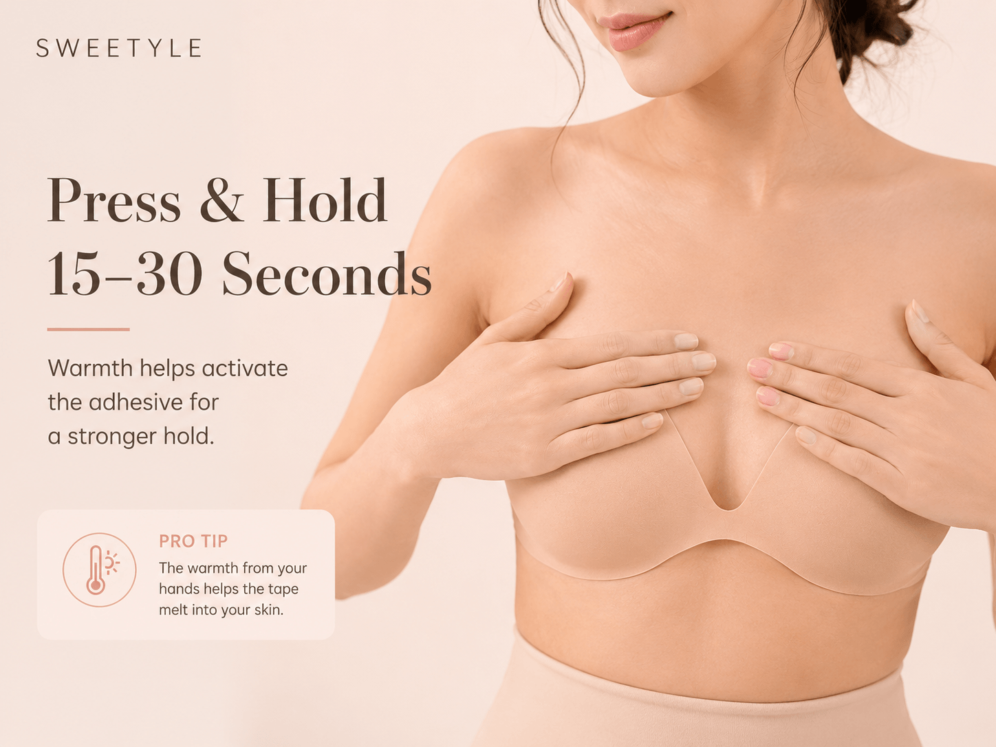Activating boob tape adhesive with hand warmth.png